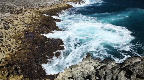 Ocean wave splash on the reef video Stock Footage 52076760