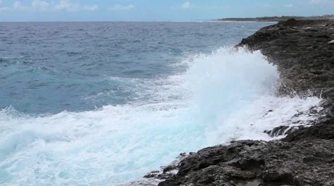Ocean wave splash on the reef video Stock Footage 52085563
