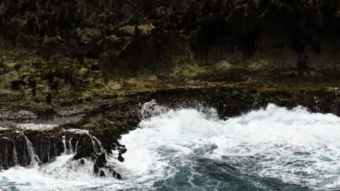 Ocean wave splashing on rocky cliff edge. Siargao, Philippines. Stock Footage 323146012