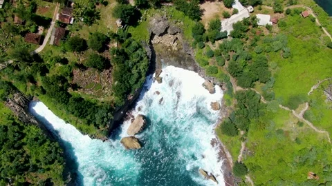 Ocean wave spread in quiet cove aerial view, Gesing Beach, Java, Indonesia Stock Footage 152586424