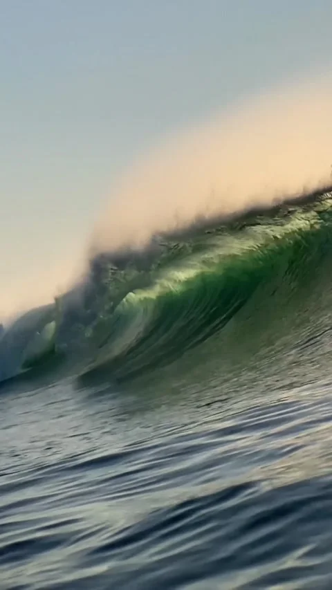 Ocean wave at sunset time.Vertial video Stock Footage 296166815