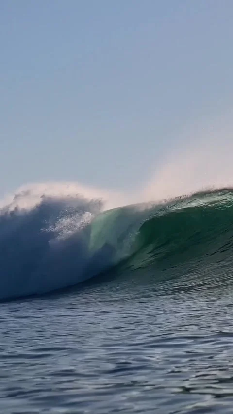 Ocean wave at sunset time.Vertial video Stock Footage 296166830