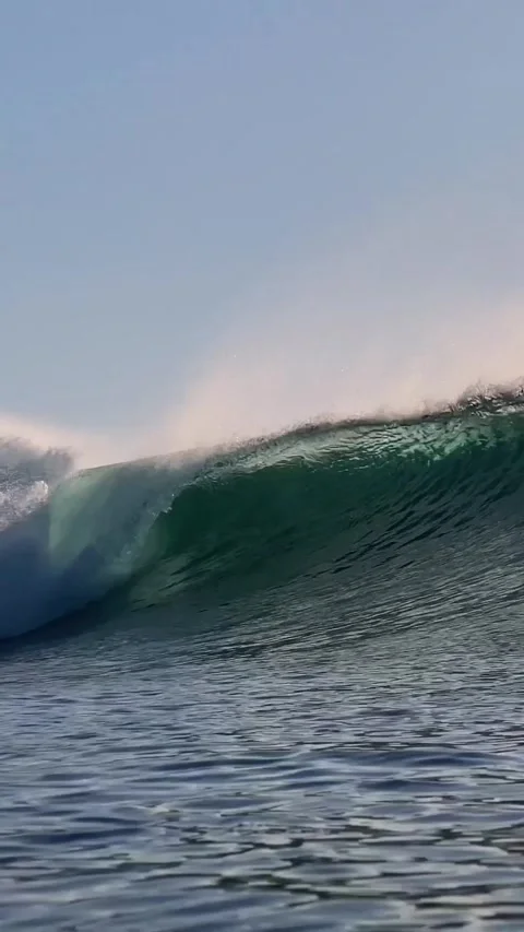 Ocean wave at sunset time.Vertial video Stock Footage 296166838