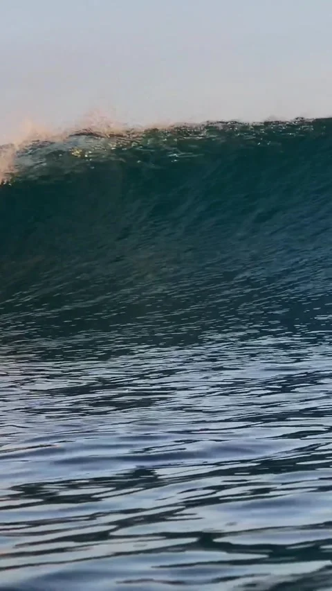 Ocean wave at sunset time.Vertial video Stock Footage 296166841