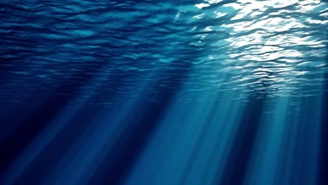 Ocean wave surface seen from underwater Rays of light make their way through Stock Footage 82878342