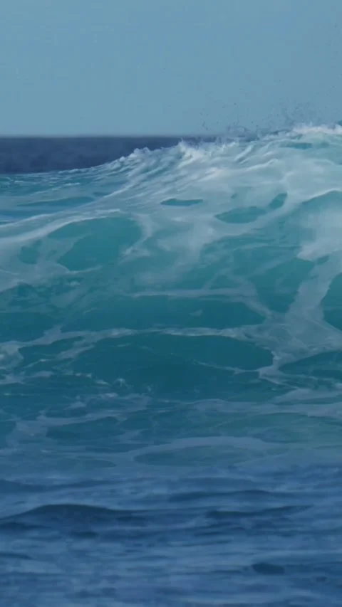 Ocean wave under blue sky.Vertical video Stock Footage 315367781