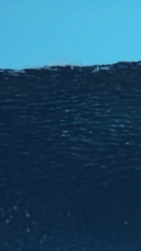 Ocean wave under blue sky.Vertical video Stock Footage 315367792