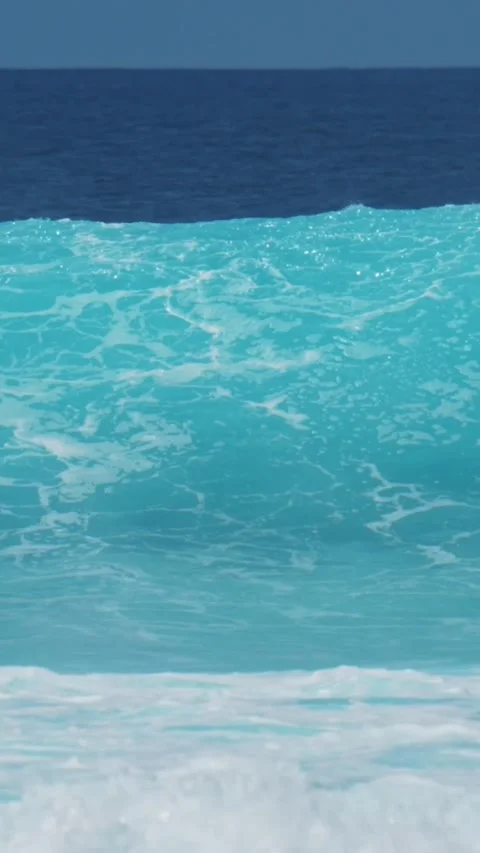 Ocean wave under blue sky.Vertical video Stock Footage 315367799
