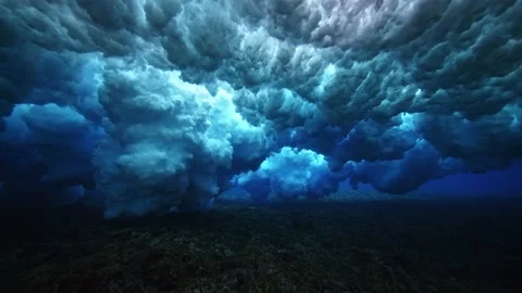 Ocean wave. Underwater view of clear ocean wave breaking over corral reef. Stock Footage 208537517