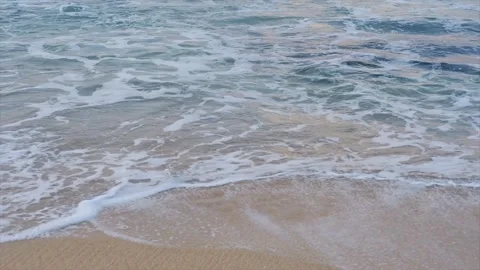 Ocean wave washes on sandy beach shore. Stock Footage 320441779