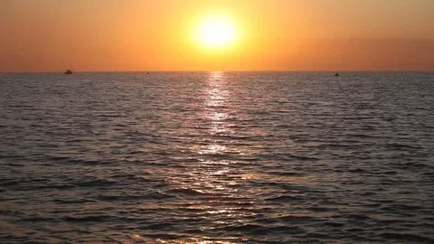 Ocean wave water surface with rising sun reflection Stock Footage 78420152