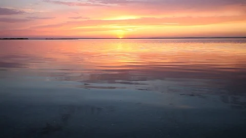 Ocean wave water surface with rising sun reflection. Florida, USA Stock Footage 87633033