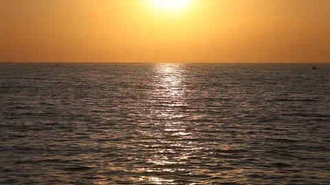 Ocean wave water surface with rising sun reflection. Florida, USA Stock Footage 87634117