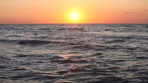 Ocean wave water surface with rising sun reflection. Florida, USA Stock Footage 87634707