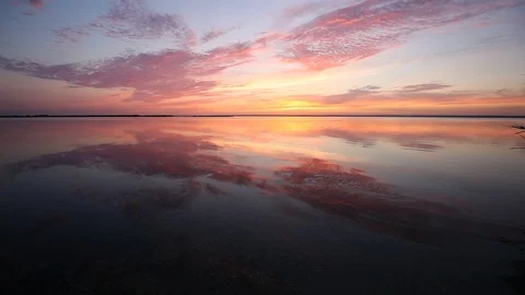 Ocean wave water surface with rising sun reflection. Florida, USA Stock Footage 87634726