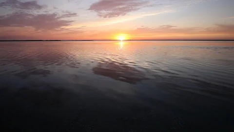 Ocean wave water surface with rising sun reflection. Florida, USA Stock Footage 87634730