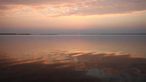 Ocean wave water surface with rising sun reflection. Florida, USA Stock Footage 87634803
