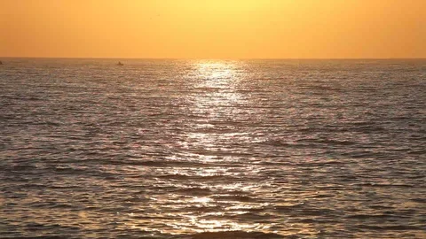 Ocean wave water surface with rising sun reflection. Florida, USA Stock Footage 87635389