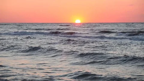 Ocean wave water surface with rising sun reflection. Florida, USA Stock Footage 87635415