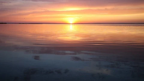 Ocean wave water surface with rising sun reflection. Florida, USA Stock Footage 87635573
