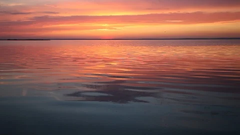 Ocean wave water surface with rising sun reflection. Florida, USA Stock Footage 87635586