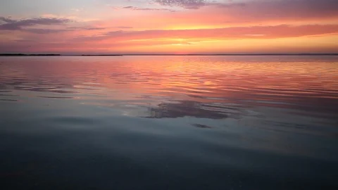 Ocean wave water surface with rising sun reflection. Florida, USA Stock Footage 87636621