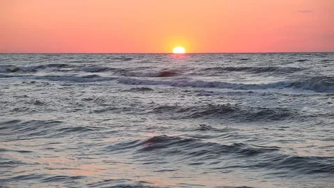 Ocean wave water surface with rising sun reflection. Florida, USA Stock Footage 87637835