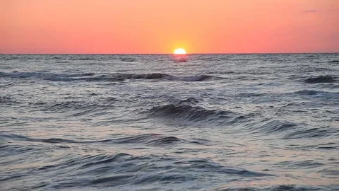 Ocean wave water surface with rising sun reflection. Florida, USA Stock Footage 87644948