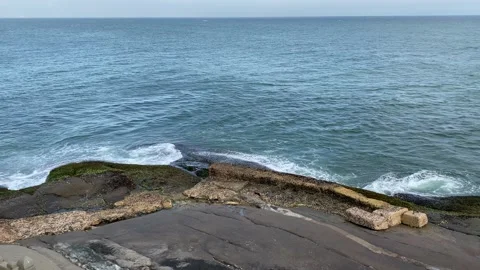 Ocean wave, The waves breaking on a stony beach, forming a spray Stock Footage 164870319