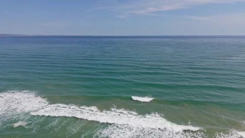 Ocean waves aerial view with sandy beach and coastline Stock Footage 332938947