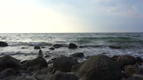 Ocean waves against rocks Stock Footage 205869724