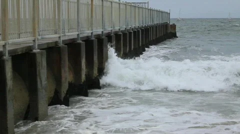 Ocean waves against wall 3 Stock Footage 759476