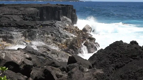 Ocean waves along the lava rock shore of the big island of Hawaii Stock Footage 34456148