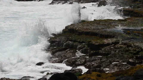 Ocean waves along the lava rock shore of the big island of Hawaii Stock Footage 34456215