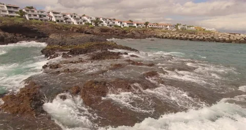 Ocean waves along a rocky coast. Stock Footage 237473974