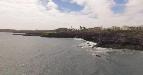Ocean waves along a rocky coast. Stock Footage 237474045