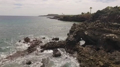 Ocean waves along a rocky coast. Stock Footage 237482076