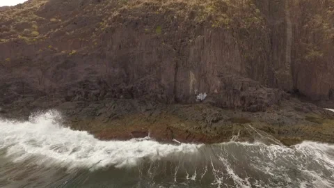 Ocean waves along a rocky coast. Stock Footage 237482327
