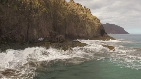 Ocean waves along a rocky coast. Stock Footage 237482404