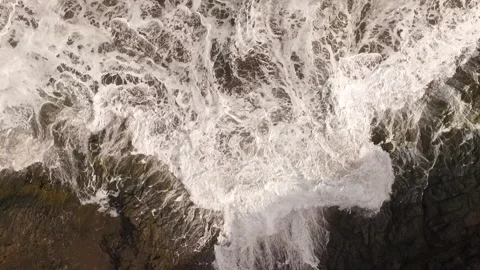 Ocean waves along a rocky coast. Видео 237482572
