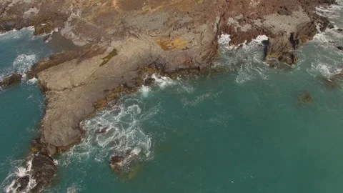 Ocean waves along a rocky coast. Stock Footage 237486050