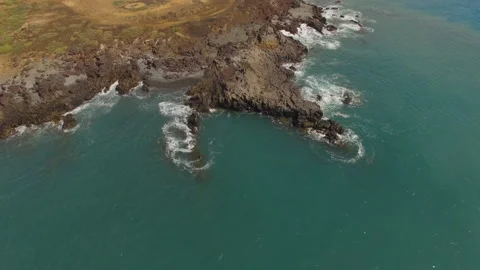Ocean waves along a rocky coast. Stock Footage 237486373