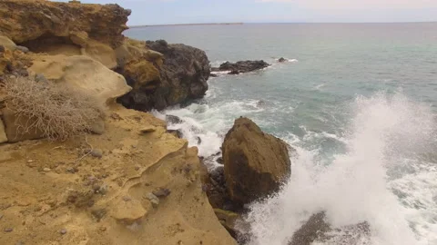 Ocean waves along a rocky coast. Stock Footage 237487090