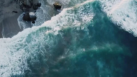 Ocean Waves Along Rocky Coast as Birds Fly Across the Sky Stock Footage 339090752
