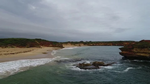 Ocean waves and cloudy skies Australia Stock Footage 84309917