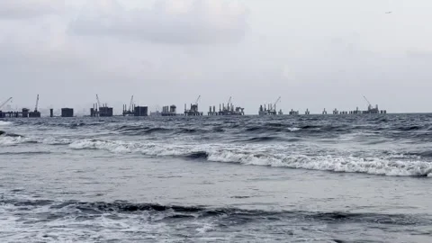 Ocean Waves and Coastal Construction Vídeos de archivo 336550944