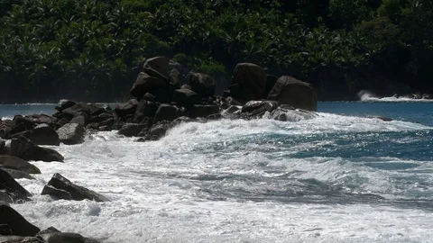 Ocean waves and granite rocks - Seychelles Mahe Island Stock Footage 122450586