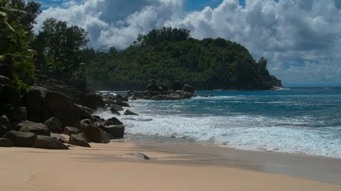 Ocean waves and granite rocks - Seychelles Mahe Island Stock Footage 122450732