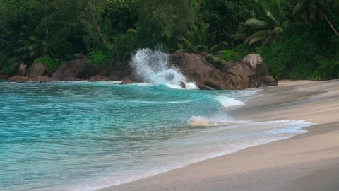 Ocean waves and granite rocks - Seychelles Mahe Island Stock Footage 122450757