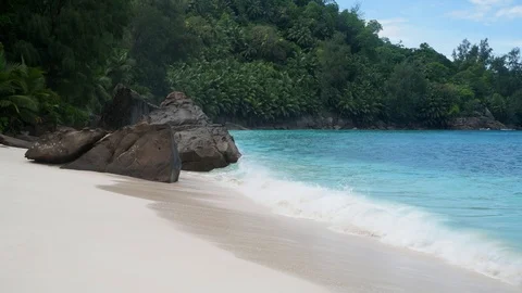 Ocean waves and granite rocks - Anse Intendance, Mahe Island, Seychelles. Stock Footage 124272687